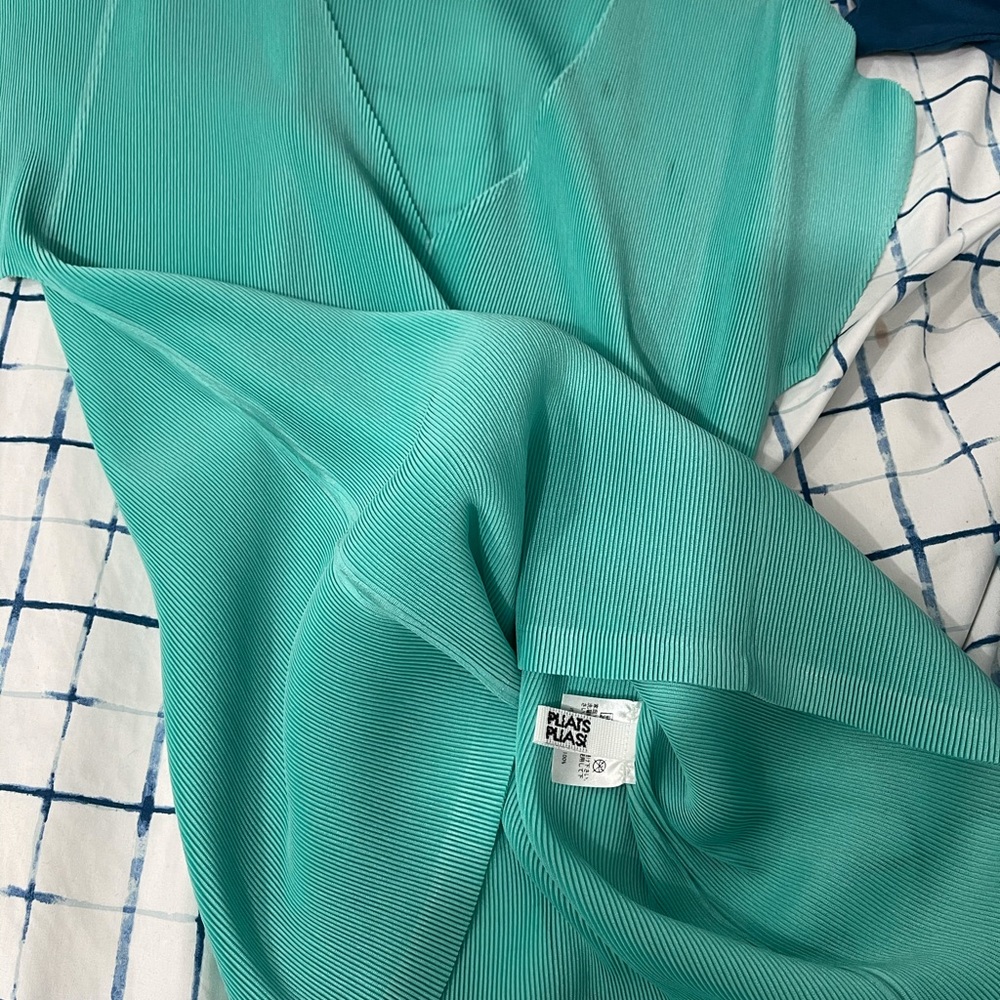 Pleats please by Issey Miyake